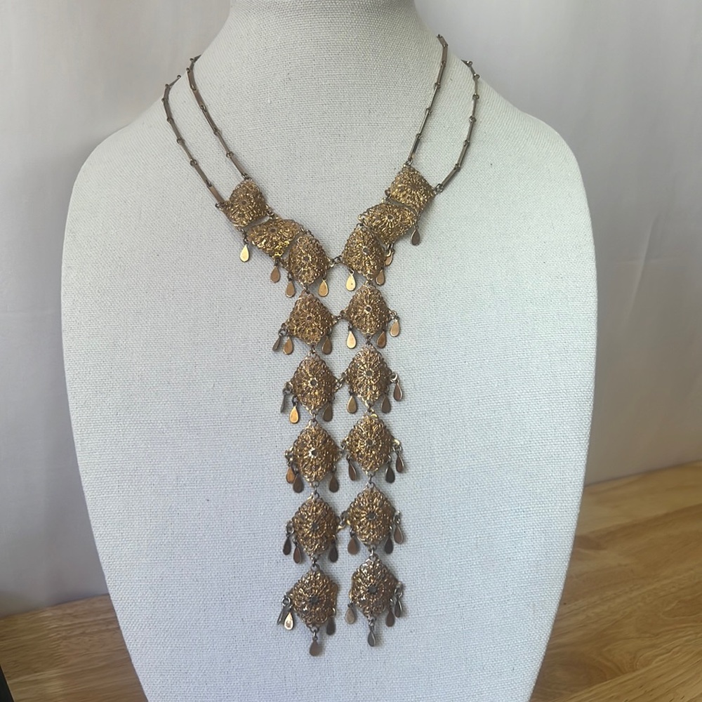 Vintage necklace 19” with 7” dangled diamond pattern.